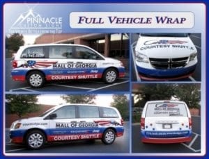 Collage of full vehicle wrap graphics for a courtesy shuttle van, designed by Pinnacle Custom Signs, featuring the branding for Mall of Georgia. The wrap includes red, white, and blue colors with stars, and displays the mall’s name and 'Courtesy Shuttle' text on the sides, front, and rear of the vehicle, enhancing mobile advertising and brand visibility.