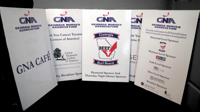 Trade show displays for the Georgia Nurses Association, featuring sponsor information and event details, created by Pinnacle Custom Signs.
