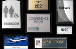 A variety of ADA compliant signs