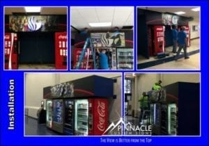Collage showing the installation process of new graphic designs for vending machine surrounds, created by Pinnacle Custom Signs. The images depict workers installing vibrant, branded graphics and headers on vending machines, transforming the vending area into a more appealing and visually engaging space.